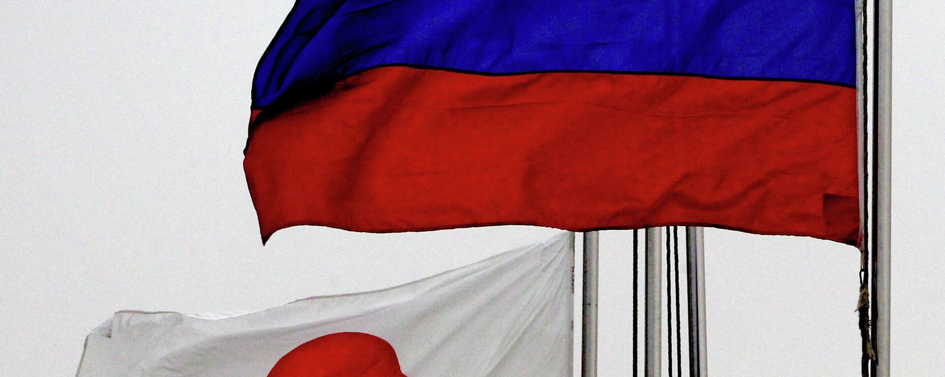 Las banderas de Japón y Rusia - Sputnik Mundo, 1920, 22.03.2022