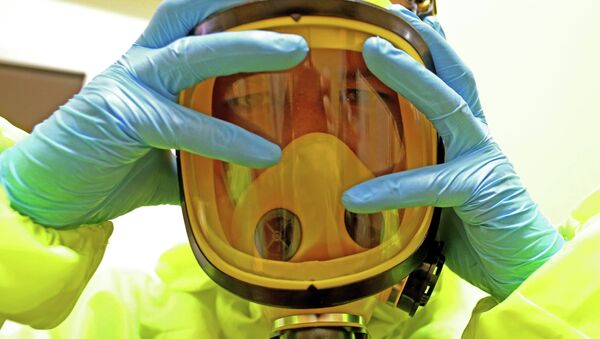 El virus del Ébola se propaga por el mundo - Sputnik Mundo