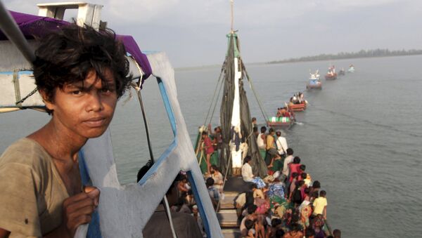 Australia debe acoger a los migrantes de Birmania y Bangladés, dice Cancillería indonesia - Sputnik Mundo