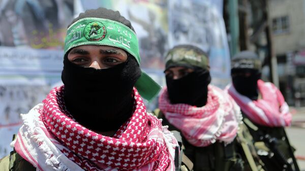 Palestinian militants of the Ezzedine al-Qassam Brigades, Hamas' armed wing, - Sputnik Mundo