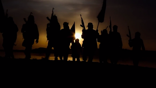 Militantes del grupo Daesh - Sputnik Mundo