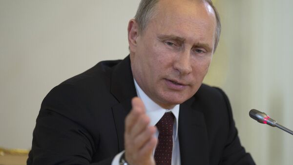 Vladímir Putin, presidente de Rusia, en el Foro Económico Internacional de San Petersburgo, 2014 - Sputnik Mundo