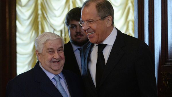 Ministro de Asuntos Exteriores de Siria, Walid Muallem y ministro de exteriores de Rusia, Serguéi Lavrov (archivo) - Sputnik Mundo