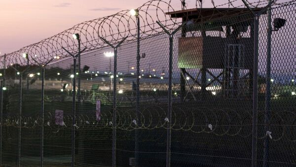 Guard tower at dawn at Camp Delta the military prison at Naval Base Guantanamo Bay Cuba - Sputnik Mundo