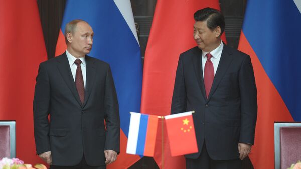 Vladímir Putin, presidente de Rusia, y Xi Jinping, presidente de China (Archivo) - Sputnik Mundo