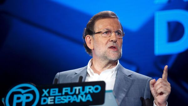Spain's Prime Minister Mariano Rajoy delivers a speech during a rally of his People's Party (PP) in Madrid, Spain, July 11, 2015 - Sputnik Mundo