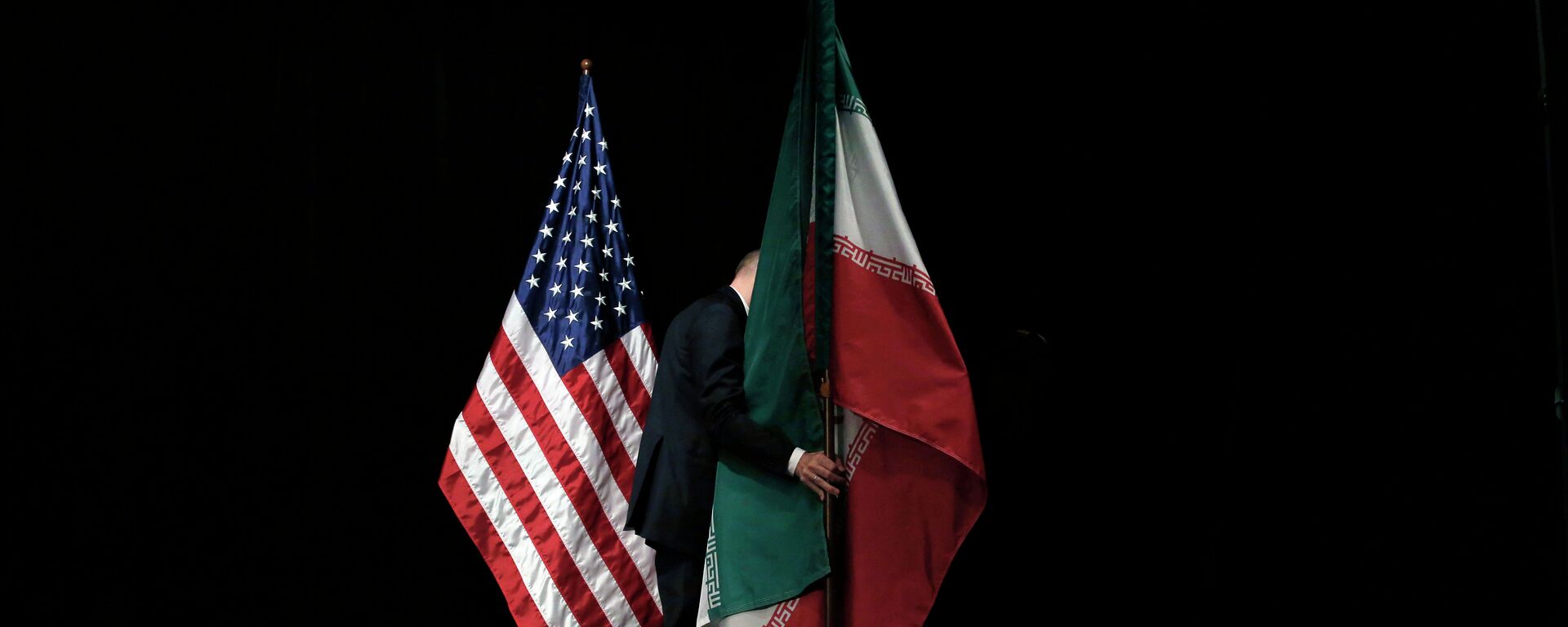 Banderas de EEUU e Irán - Sputnik Mundo, 1920, 04.02.2021