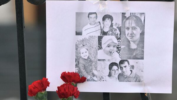 Fotografía de miembros de familia asesinada - Sputnik Mundo
