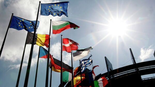 Flags are seen at the European Parliament - Sputnik Mundo