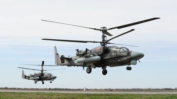 Unos helicópteros de combate polivalentes rusos (archivo) - Sputnik Mundo