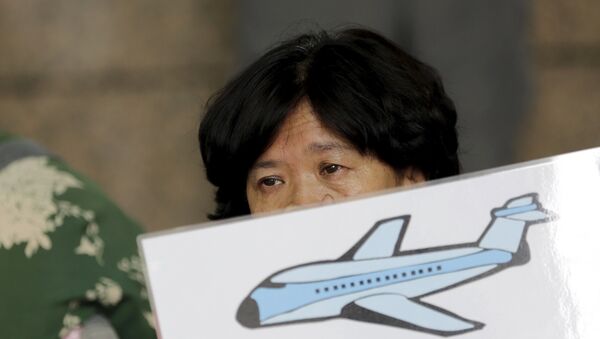 Familiares de los pasajeros del vuelo MH370 - Sputnik Mundo