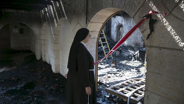 Iglesia quemada en Israel - Sputnik Mundo