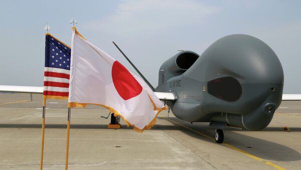 An advanced Global Hawk surveillance drone is displayed outside its hangar at Misawa Air Base in northern Japan - Sputnik Mundo