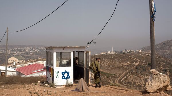 Unos soldados israelíes en Cisjordania - Sputnik Mundo