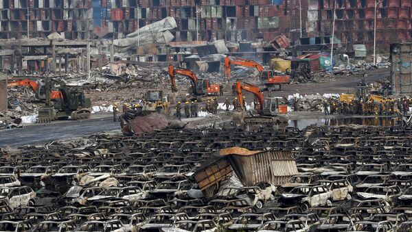 Lugar de explosiones en el distrito de Binhai en Tianjin, China - Sputnik Mundo