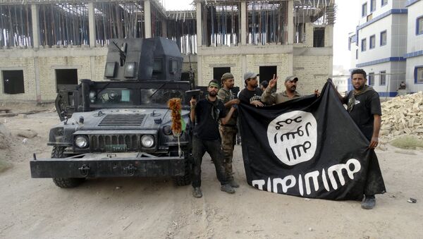 Milicianos de Estado Islámico - Sputnik Mundo