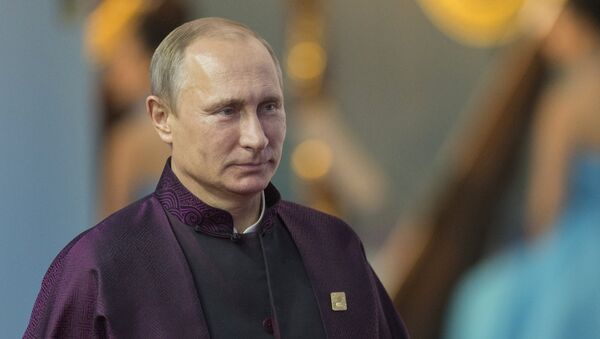 Vladímir Putin durante su visita a China en 2014 - Sputnik Mundo