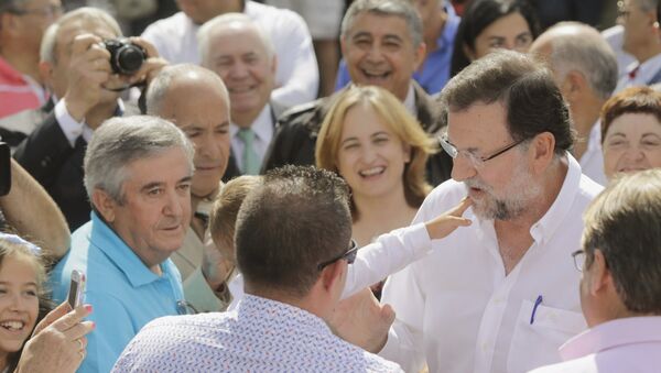 Mariano Rajoy, líder del Partido Popular (PP), durante su visita a Portomarin, norte de España - Sputnik Mundo
