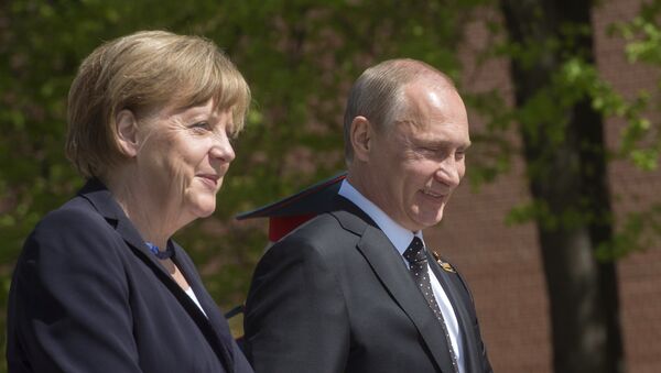 Canciller de Alemania, Angela Merkel y presidente de Rusia, Vladímir Putin (archivo) - Sputnik Mundo