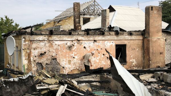 Consecuencias del bombardeo en Donetsk - Sputnik Mundo