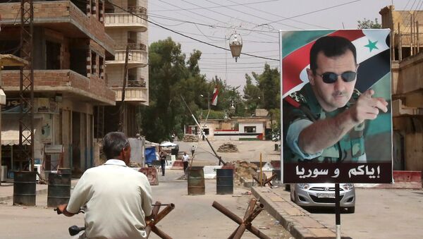 El retrato del presidente de Siria, Bashar Asad - Sputnik Mundo