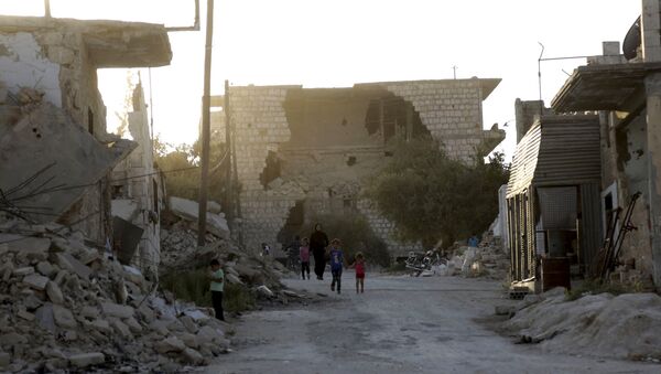 Edificios destruidos en Idlib - Sputnik Mundo