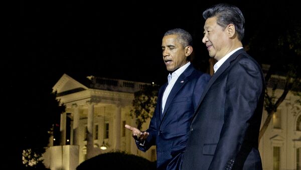 Presidente de EEUU, Barack Obama y presidente de China, Xi Jinping durante una reunión en septiembre de 2015 - Sputnik Mundo