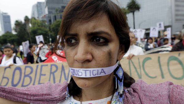 Un año de la masacre de los estudiantes de magisterio rural de Ayotzinapa. Manifestación, Ciudad de México - Sputnik Mundo