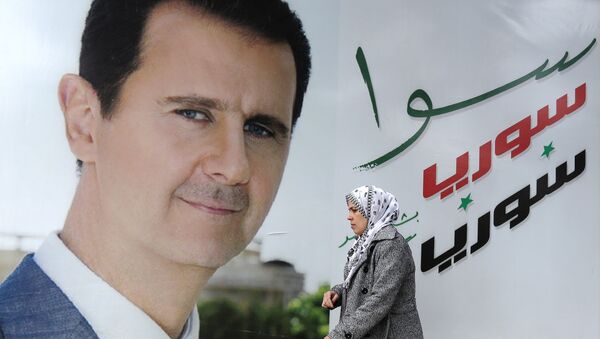 Póster con presidente de Siria Bashar Asad - Sputnik Mundo