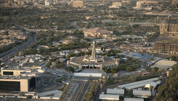 A general view taken from a helicopter shows the Baghdad clock tower in Harthiya Sqaure in the west of the Iraqi capital on September 10, 2014 - Sputnik Mundo
