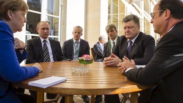 Angela Merkel, Vladímir Putin, Petró Poroshenko y Francois Hollande durante la cumbre del Cuarteto de Normandía - Sputnik Mundo