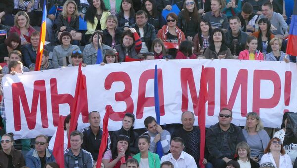 El movimiento 'República popular de Donetsk'. El cartel dice: 'Estamos por la paz' - Sputnik Mundo