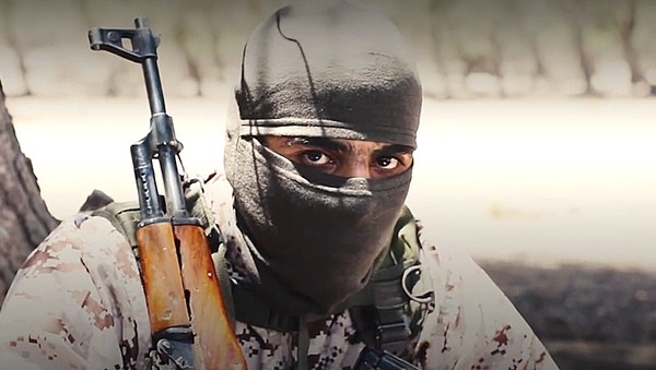 Militante del grupo terrorista Estado Islámico - Sputnik Mundo