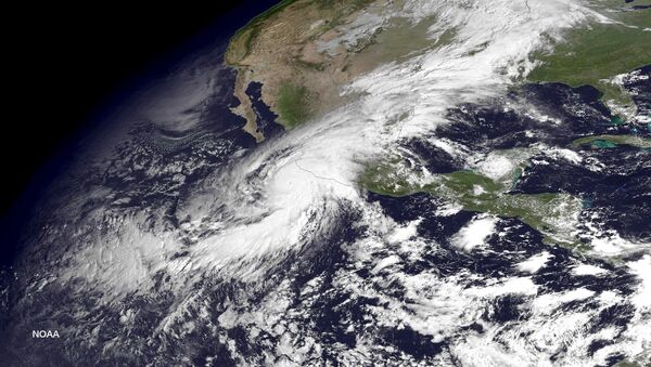 Hurricane Patricia, a category 5 storm, is seen approaching the coast of Mexico in a NOAA satellite image taken by GOES East at 10:45 ET (14:45 GMT) October 23, 2015. - Sputnik Mundo