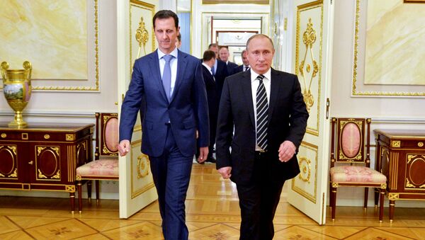 Presidente de Siria, Bashar Asad y presidente de Rusia, Vladímir Putin, durante un encuentro en el Kremlin. el 20 de octubre de 2015 - Sputnik Mundo