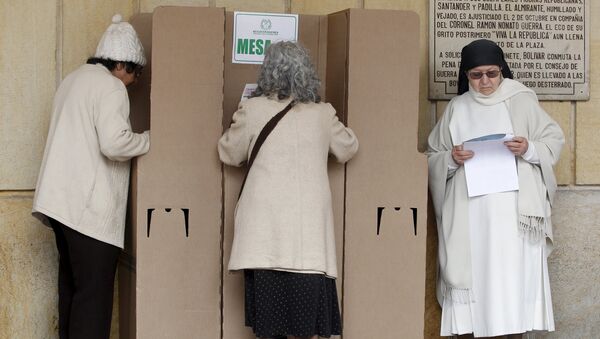 Mujeres colombianas votan en elecciones locales en Colombia - Sputnik Mundo
