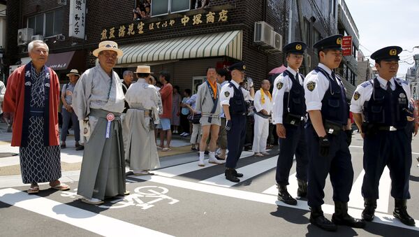 Policías en Tokio - Sputnik Mundo