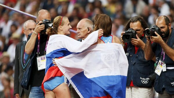 Atletas rusas María Savinova y Ekaterina Poistogova, JJOO de 2012 en Londres - Sputnik Mundo
