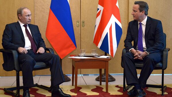 Presidente de Rusia, Vladímir Putin y primer ministro del Reino Unido, David Cameron - Sputnik Mundo