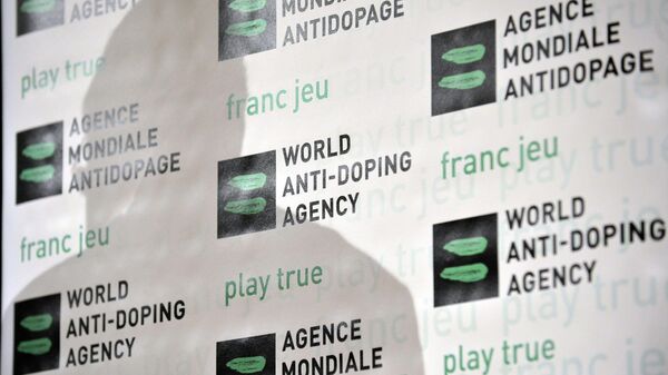 The shadow of Australian John Fahey, President of the World Anti-Doping Agency, WADA, is seen during a WADA Media Symposium at the Olympic Museum in Lausanne, Switzerland - Sputnik Mundo