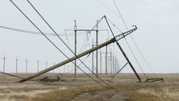 Torre de eléctrica dañada en la región de Jersón, cerca la frontera con Crimea - Sputnik Mundo