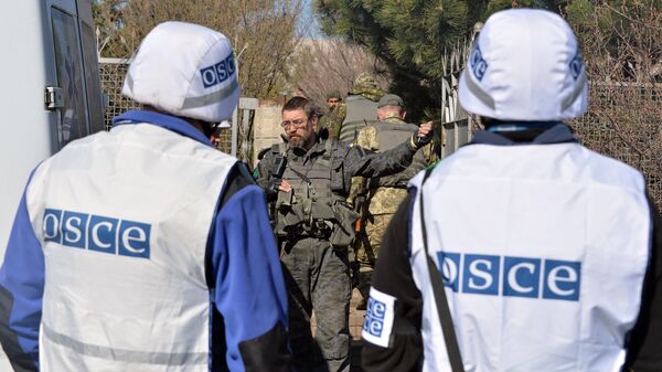 Observadores de la OSCE en Ucrania (archivo) - Sputnik Mundo