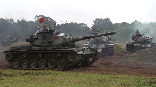 Taiwanese soldiers operate the US-made M60-A3 tanks during a military exercise in Hualien, Taiwan (File) - Sputnik Mundo