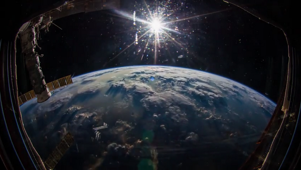 Mirada desde el espacio. La puesta del sol sobre el Océano Pacífico - Sputnik Mundo