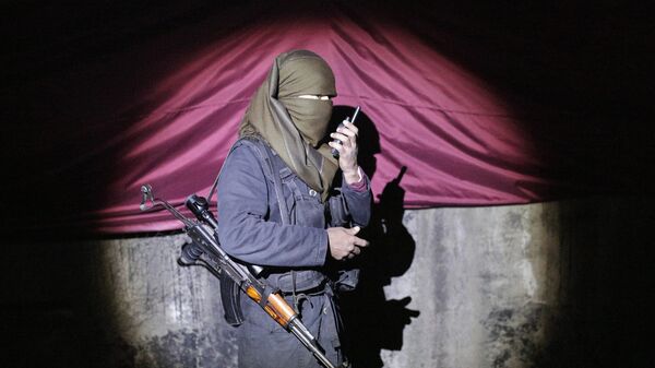 Miliciano de PKK - Sputnik Mundo