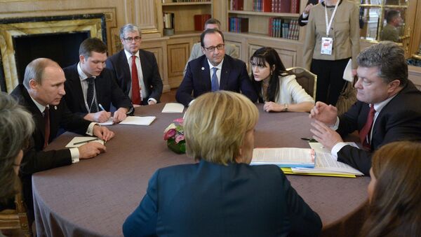 Angela Merkel, Vladímir Putin, François Hollande y Petró Poroshenko durante la cumbre del Cuarteto de Normandía (archivo) - Sputnik Mundo