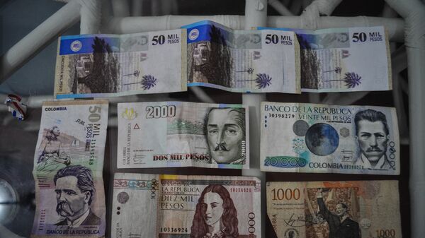 Pesos colombianos (archivo) - Sputnik Mundo