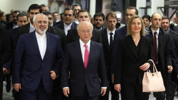 Ministro de Exteriores de Irán, Javad Zarif, director general de la OIEA, Yukiya Amano y alta representante para Asuntos Exteriores de la UE, Federica Mogherini durante la reunión sobre programa nuclear iraní - Sputnik Mundo