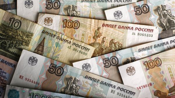Russian rouble banknotes of various denominations - Sputnik Mundo