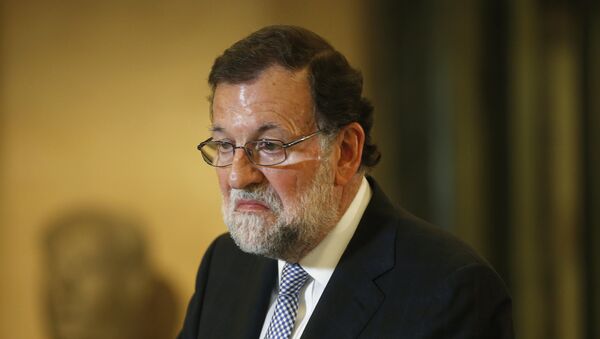 Spanish acting Prime Minister Mariano Rajoy gestures during a news conference after his meeting with Ciudadanos party leader Albert Rivera at the Spanish Parliament in Madrid, Spain, February 11, 2016. - Sputnik Mundo